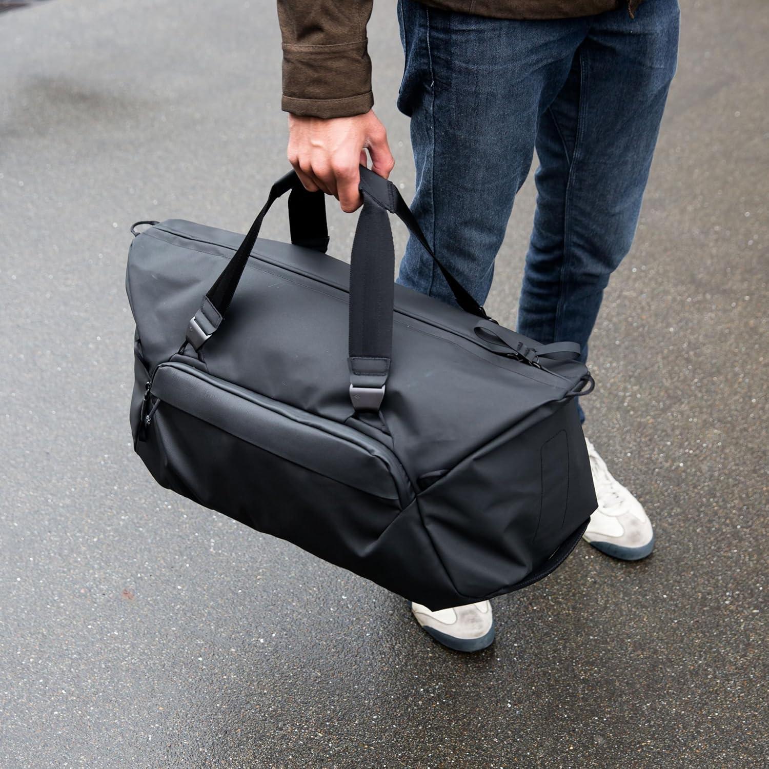 imagePeak Design Travel Duffel ExtraWide Single Zip Access Weatherproof Shell 4 External Pockets Fits Packing Cubes amp Camera Cubes Ideal for Weekend Trips Versatile Duffel Bag for TravelBlack